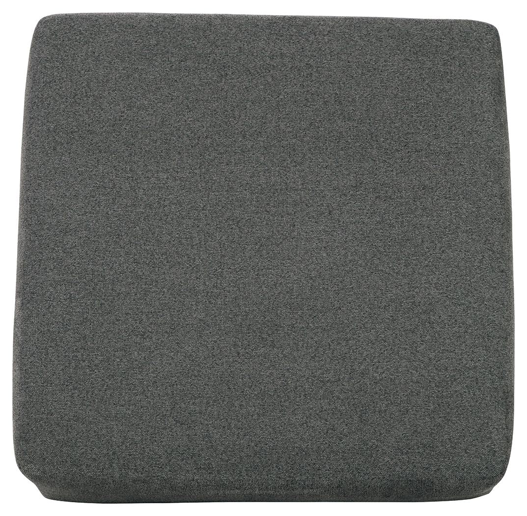 Oversized accent ottoman in dark gray fabric with rounded top and short legs