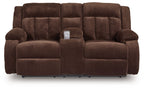 Chocolate brown double reclining loveseat with center console and padded arms