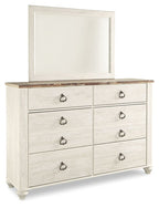 Beige dresser with rectangular mirror and six drawers, bronze knob hardware