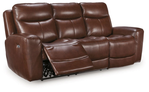 Dark brown power reclining sofa with adjustable headrests and padded armrests