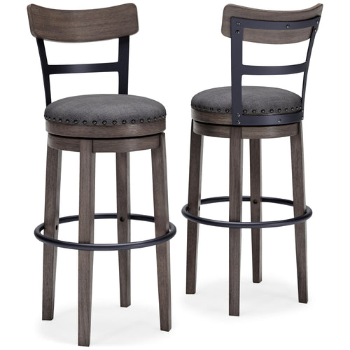 Gray upholstered tall swivel barstool with dark wood legs and round footrest