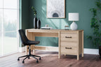 Tan home office desk with two drawers in an office workspace