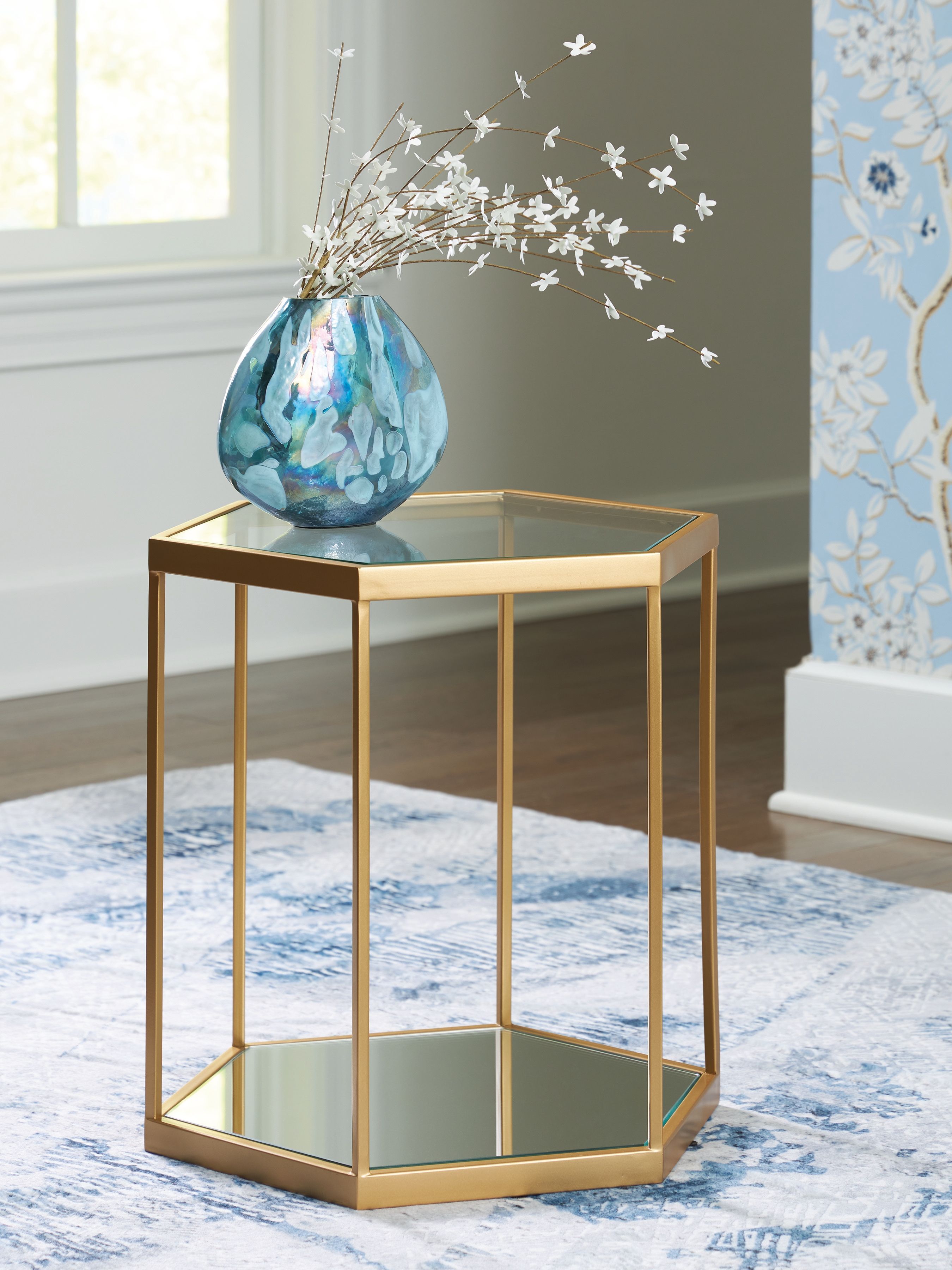 Gold-finish glass-topped octagonal side table with lower clear shelf