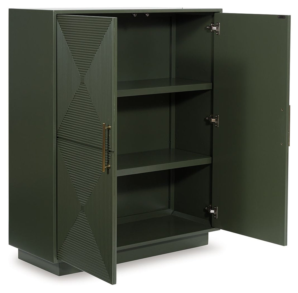 Dark green accent cabinet with open shelves, patterned doors, and brass-tone hardware