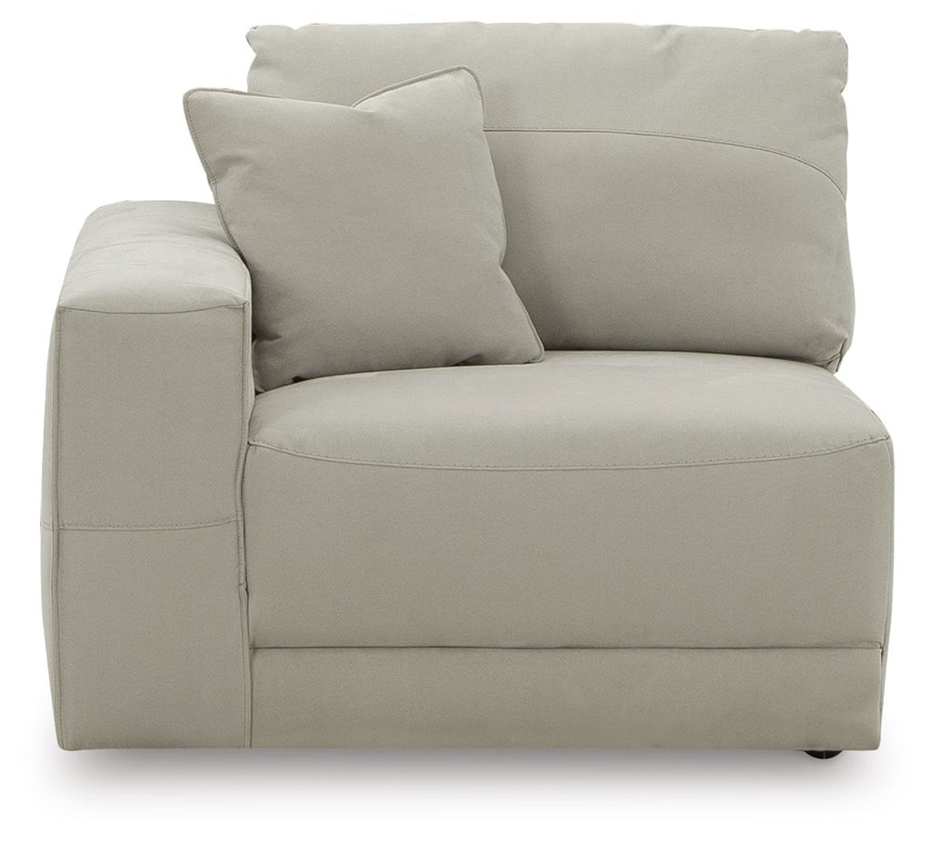 Gray armchair with thick seat cushion, tufted side panel, and two back pillows
