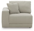 Gray armchair with thick seat cushion, tufted side panel, and two back pillows