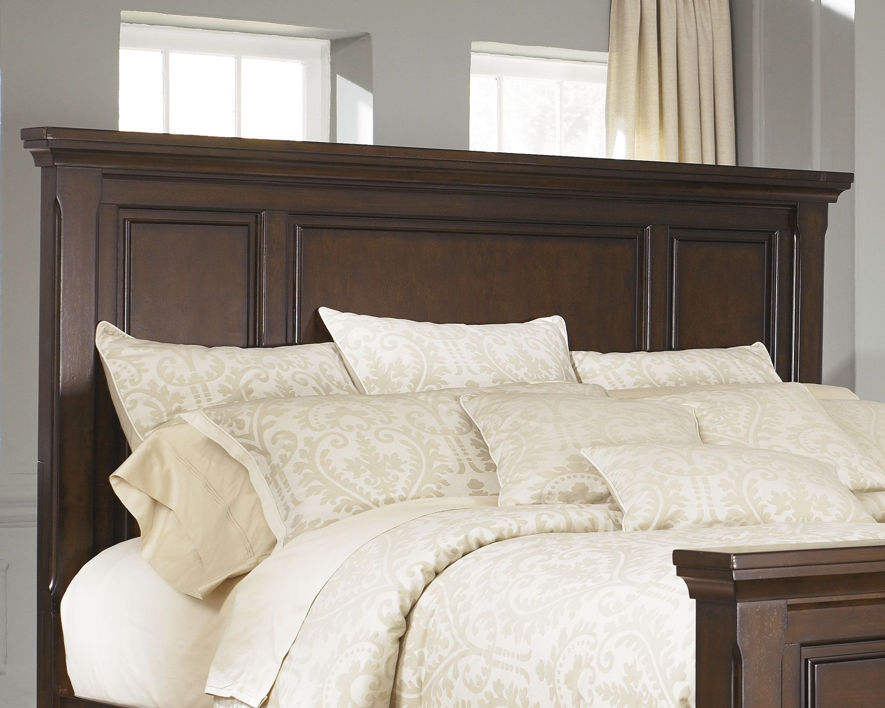 Queen panel headboard in rustic dark brown with raised top rail and inset panels