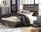 Panel bed with dark distressed wood frame and slat headboard; bed skirt and pillows shown