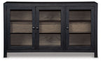 Dark gray accent cabinet with three closed doors and interior shelving behind them