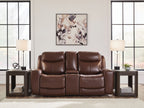 Dark brown power reclining loveseat with console and padded armrests