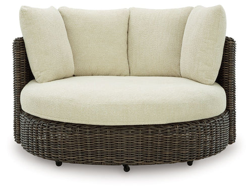 Swivel lounge chair with cushion, beige upholstery and dark brown woven rattan base