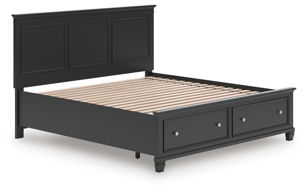 Black panel bed frame with slatted base and two drawers at the footboard