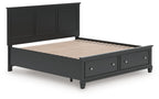 Black panel bed frame with slatted base and two drawers at the footboard