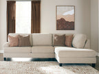 Light beige sectional sofa with right corner chaise, dark legs, 5 accent pillows