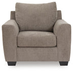 Loreo chair in light brown beige fabric with padded arms and inner seat cushion
