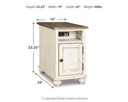 White chair side end table with dark brown top, cabinet door, turned feet
