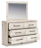 Light natural dresser with mirror; side view of six drawers with black bar pulls