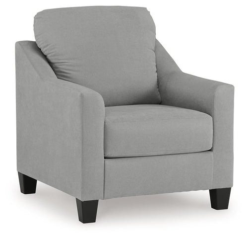 Upholstered accent chair with tall back and light gray fabric, padded armrests.