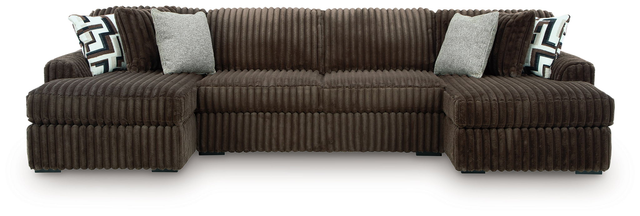 Brown corduroy sectional sofa with chaise corner and light gray pillows