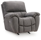 Gray power rocker recliner with padded arms, adjustable headrest, and recline footrest