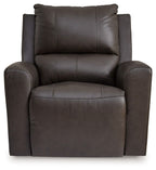 Dark brown power rocker recliner with tall backrest, padded seat, and wide side panels
