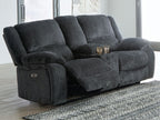 Dark gray reclining loveseat shown reclined with side control panel
