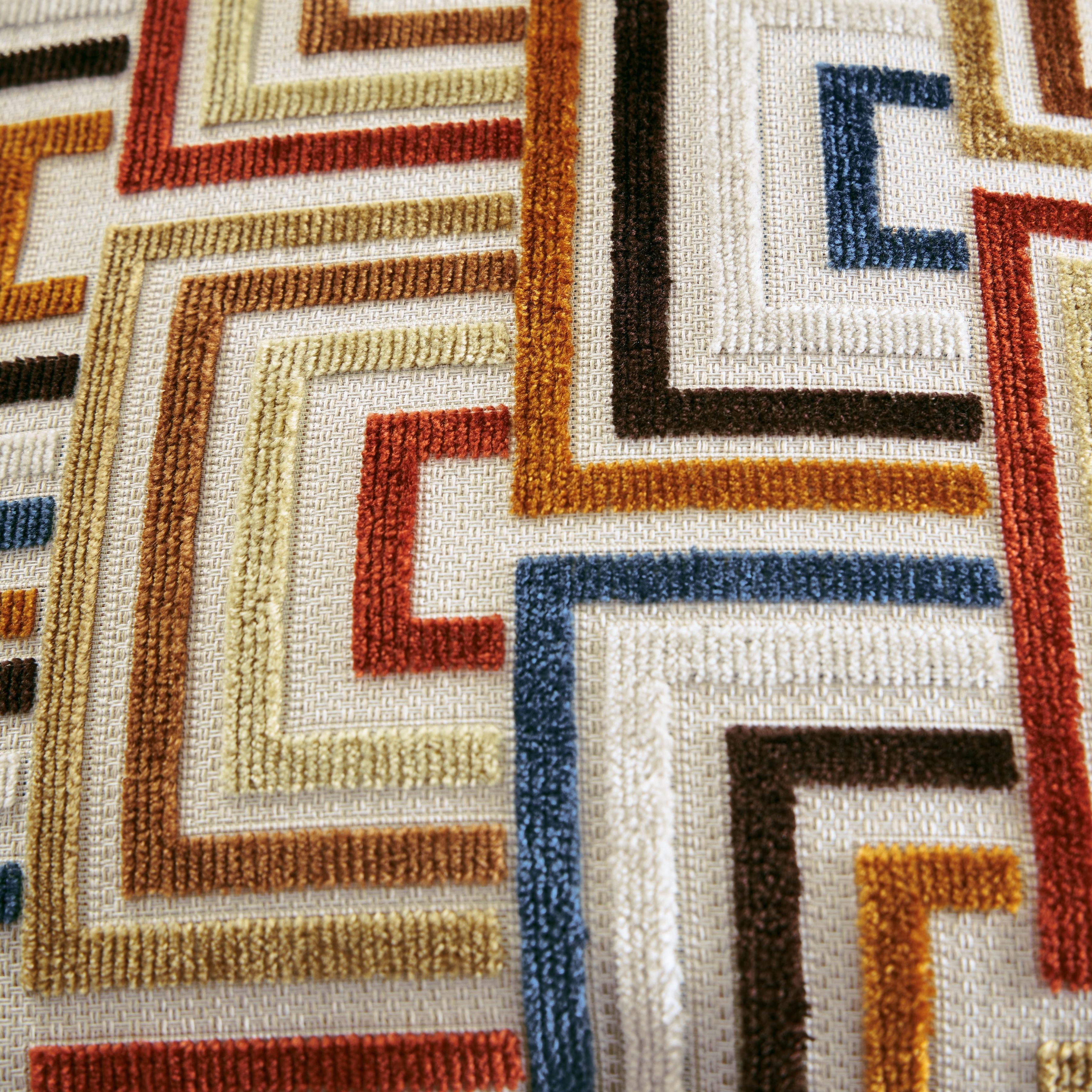 Geometric accent pillow cover with multicolor patterned embroidery