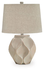 Distressed cream paper table lamp with drum fabric shade and faceted pedestal base