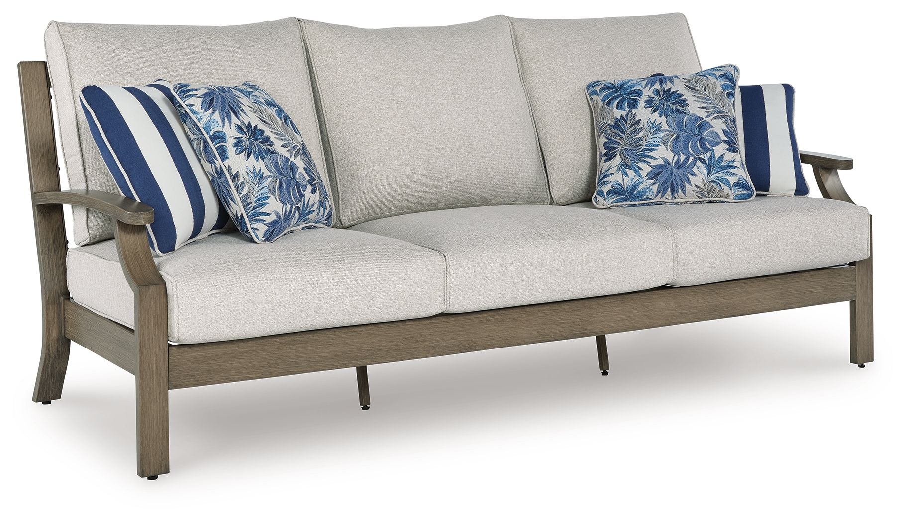 Light gray sofa with two blue patterned throw pillows and striped cushions, dark wood frame