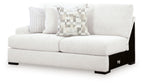 Chalk upholstered loveseat with left arm, thick seat cushions, and geometric pillows