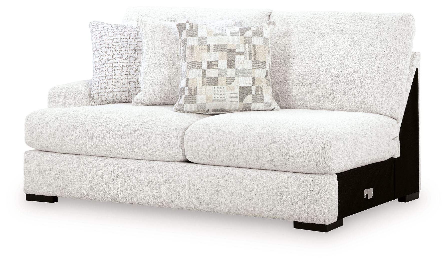 Chalk upholstered loveseat with left arm, thick seat cushions, and geometric pillows