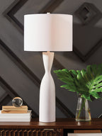 White poly table lamp with rectangular fabric shade and tall sculpted base