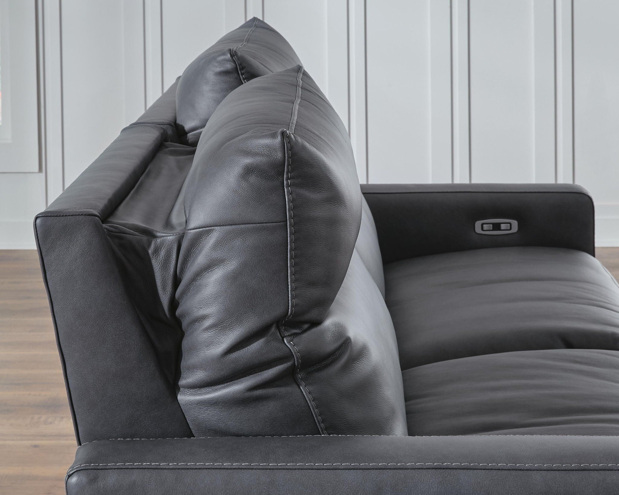 Dark gray power recliner sectional armrest with adjustable headrest control button