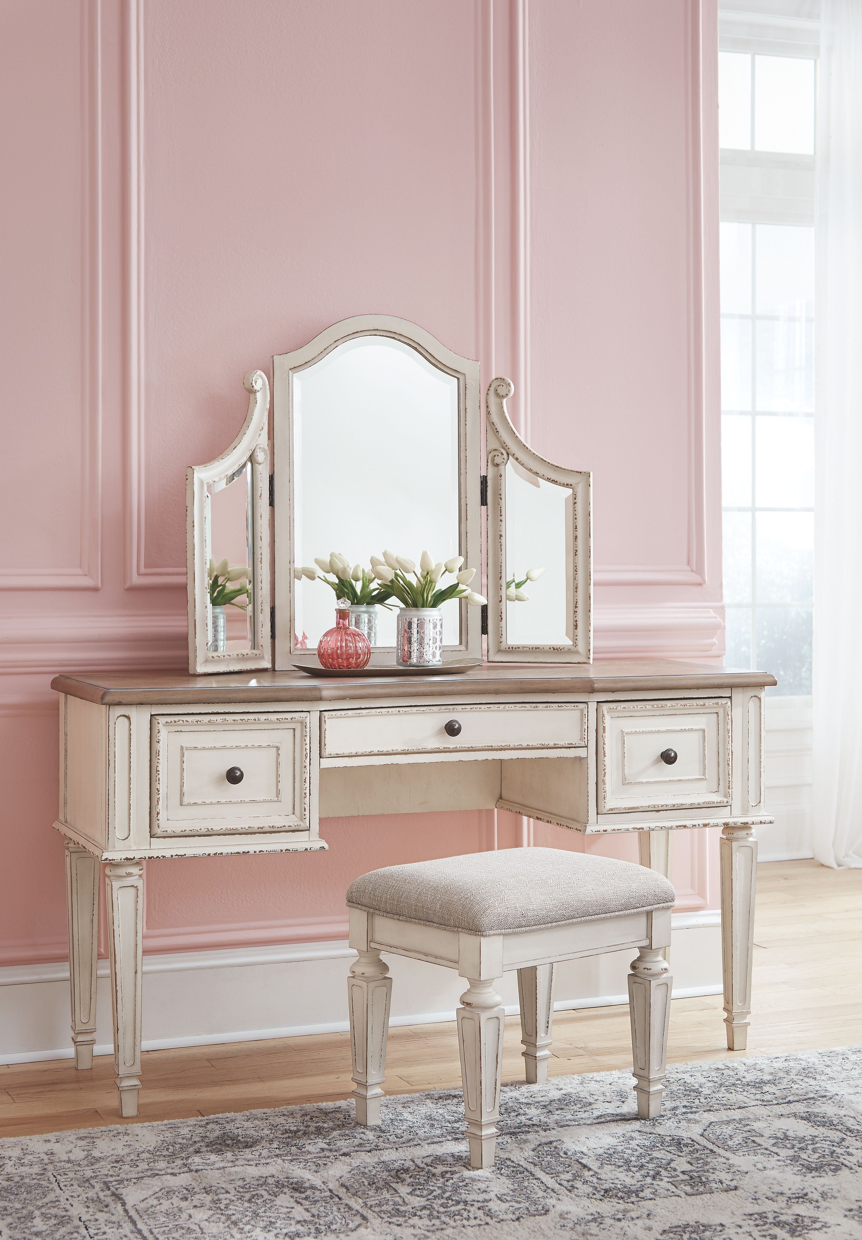 Corner vanity with arched mirror, drawers on both sides, and beige upholstered stool