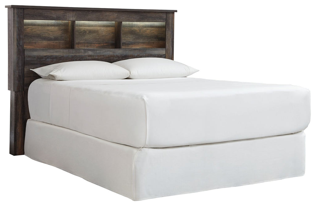 Bookcase headboard with white upholstered bed, two pillows, dark wood frame