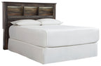 Bookcase headboard with white upholstered bed, two pillows, dark wood frame