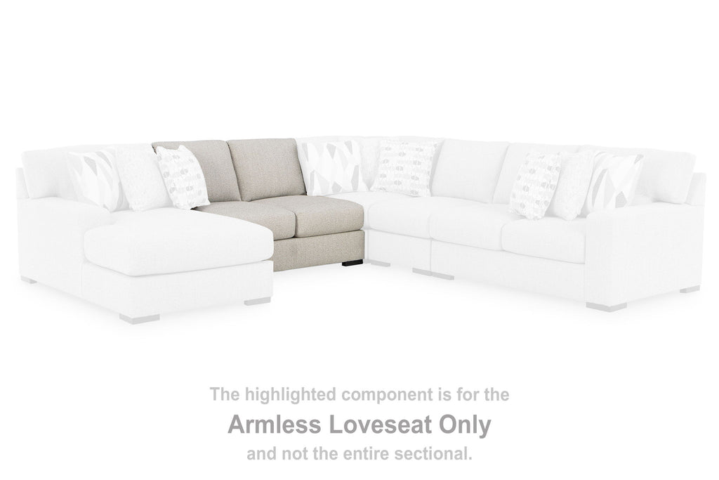 Armless loveseat component shown in light gray fabric within a sectional layout