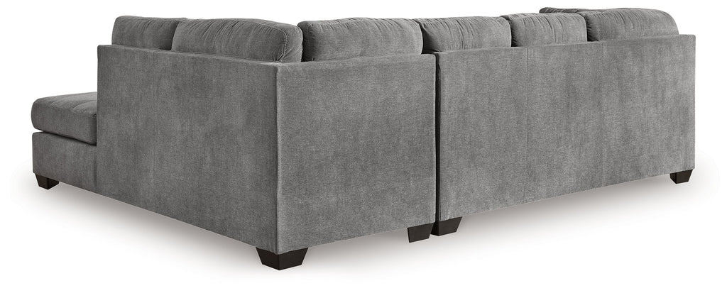 Light gray sectional sleeper sofa with tufted back pillows and wide arms, block feet