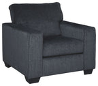 Dark gray fabric arm chair with tall back, padded arms, and boxy seat cushion