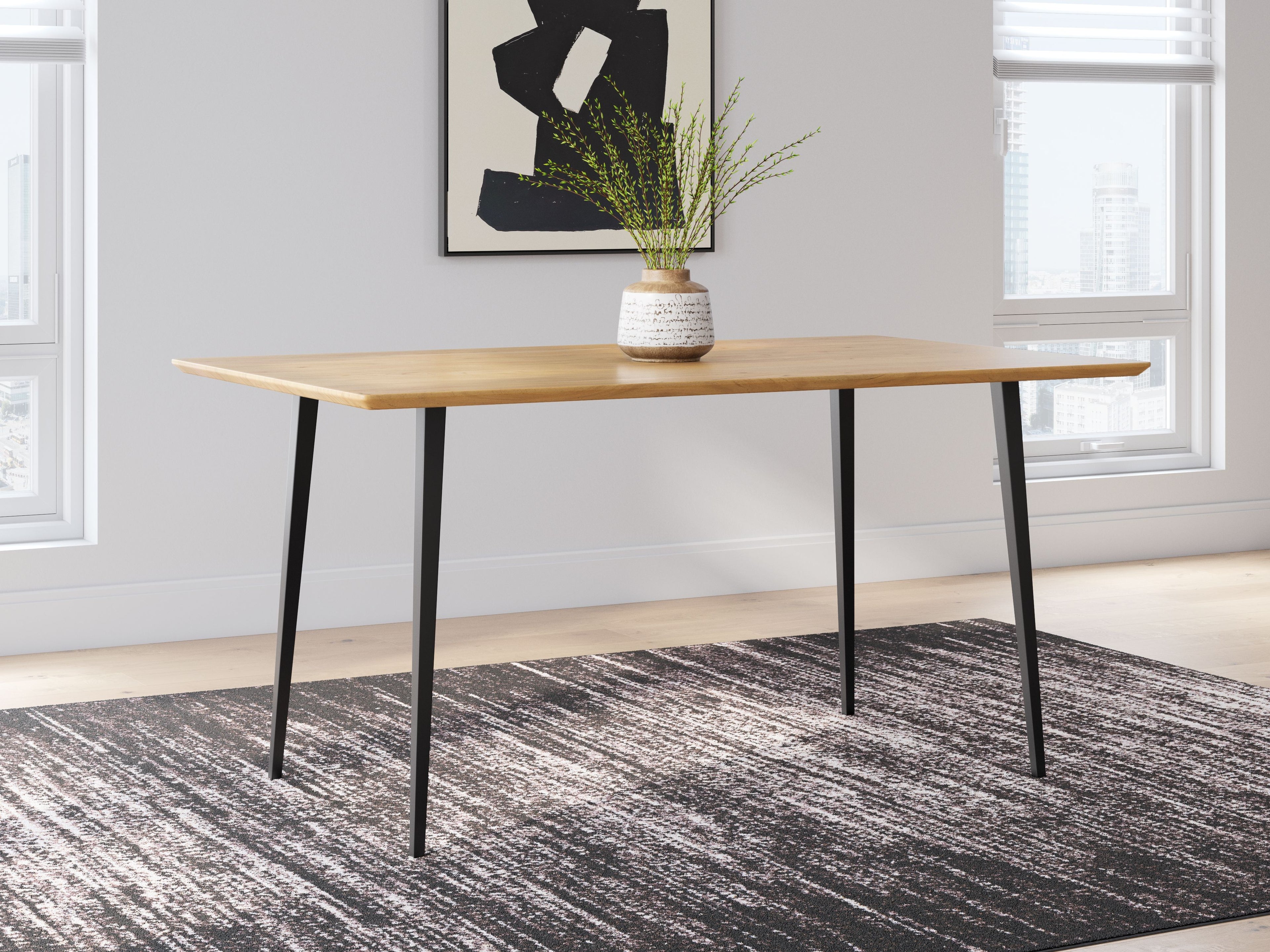 Rectangular dining table with natural wood top and black legs