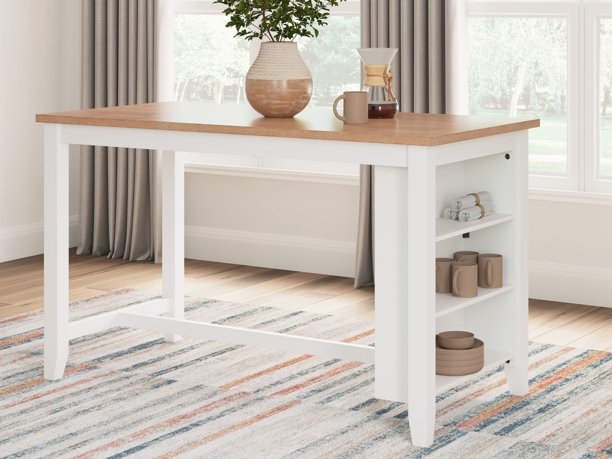 White dining room counter table with light wood top and open lower storage shelves