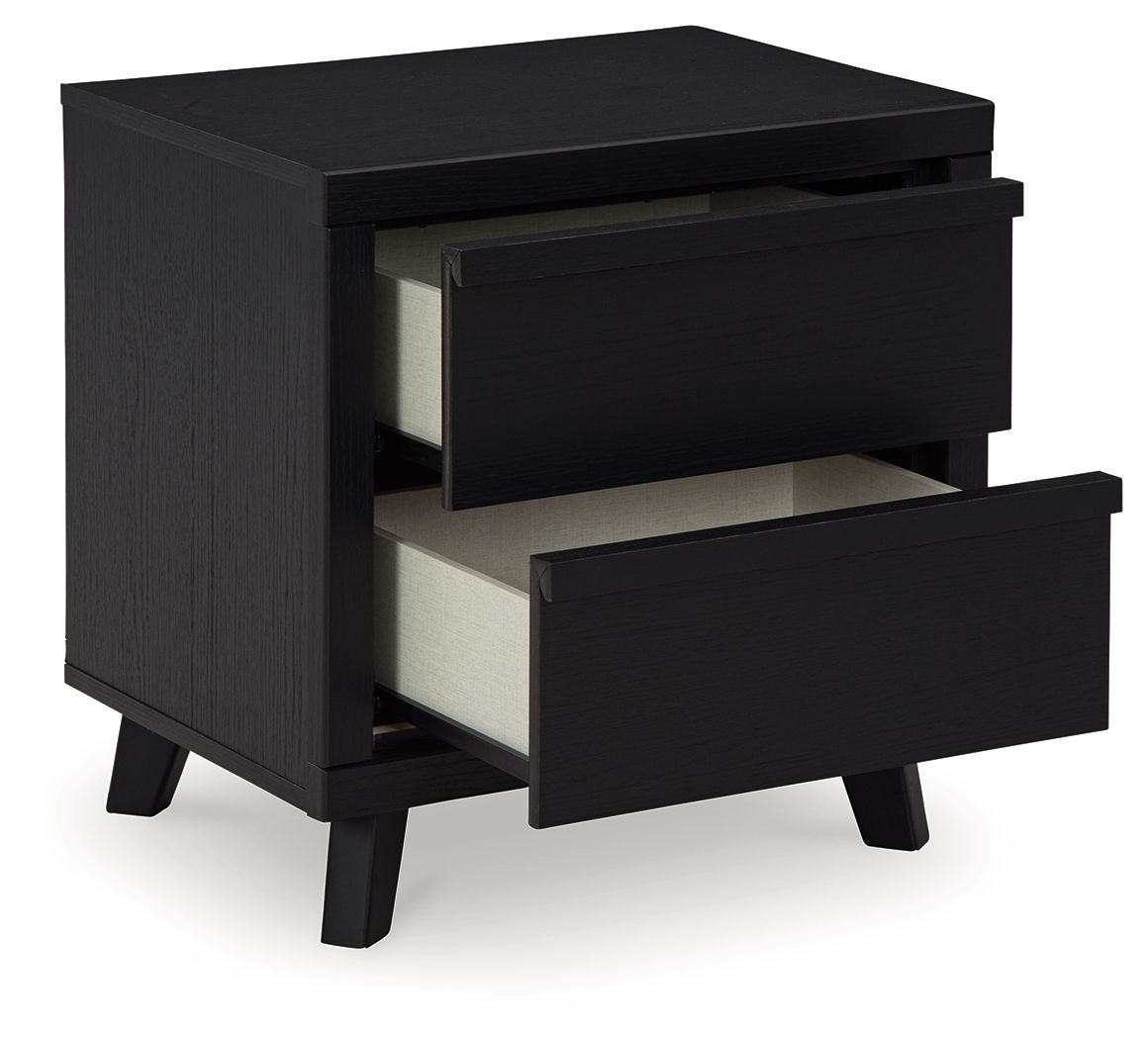 Black two-drawer night stand with drawers open, revealing light interior lining