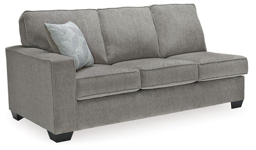Grey upholstered loveseat sofa with tufted cushions, square arms, and black legs