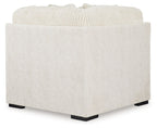Ivory sectional wedge chair, plain fabric back and sides, black feet