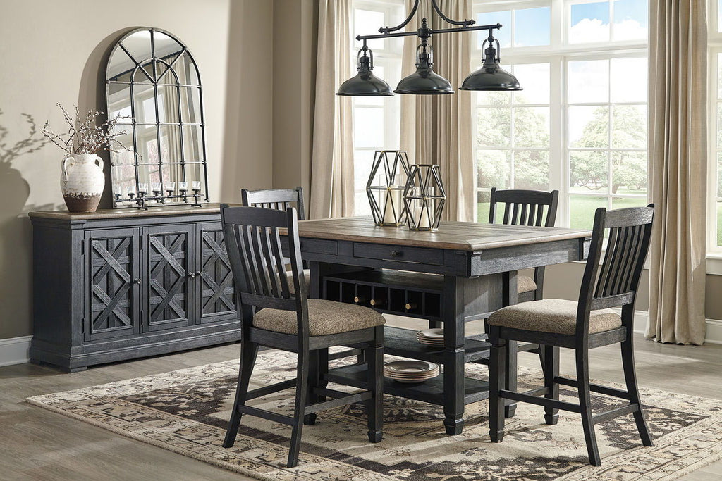 Dark gray counter height dining table with four slat-back bar stools and side cabinet