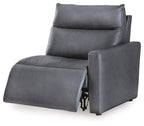Dark blue power recliner with extendable footrest and supportive back cushion