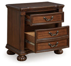 Lavinton three-drawer night stand, brown finish, drawers open with metal slides and pulls