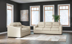 Almond upholstered sofa and loveseat set with boxy arms and low black feet