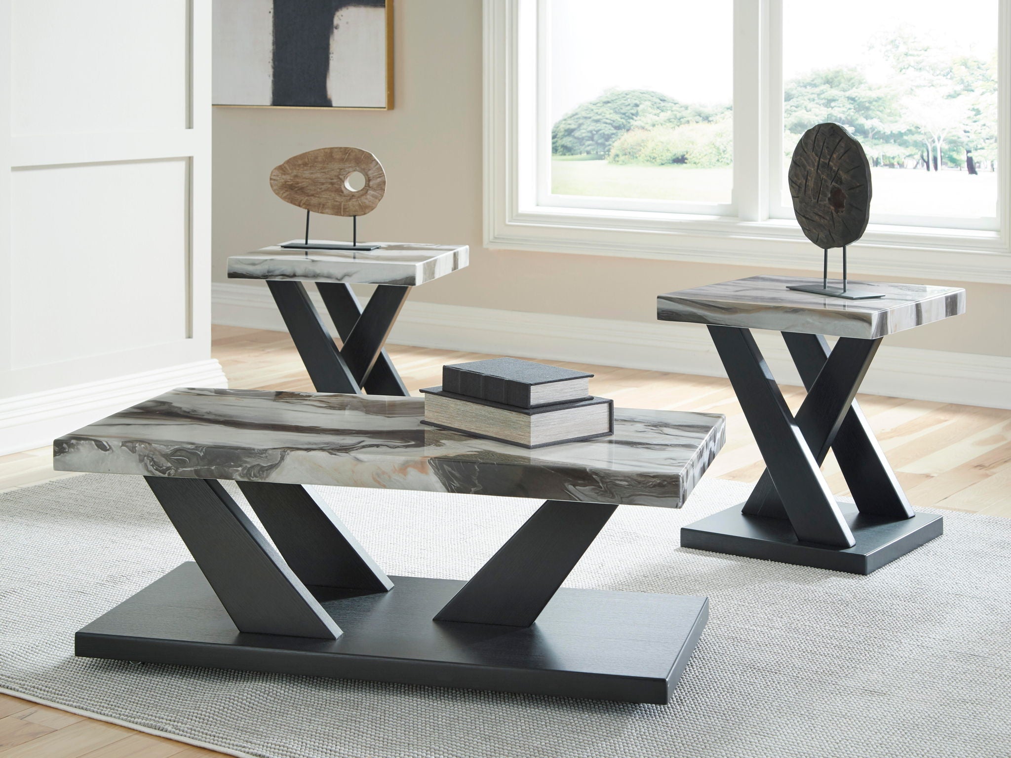 Three-piece occasional table set with marble-look tops and black X-frame bases