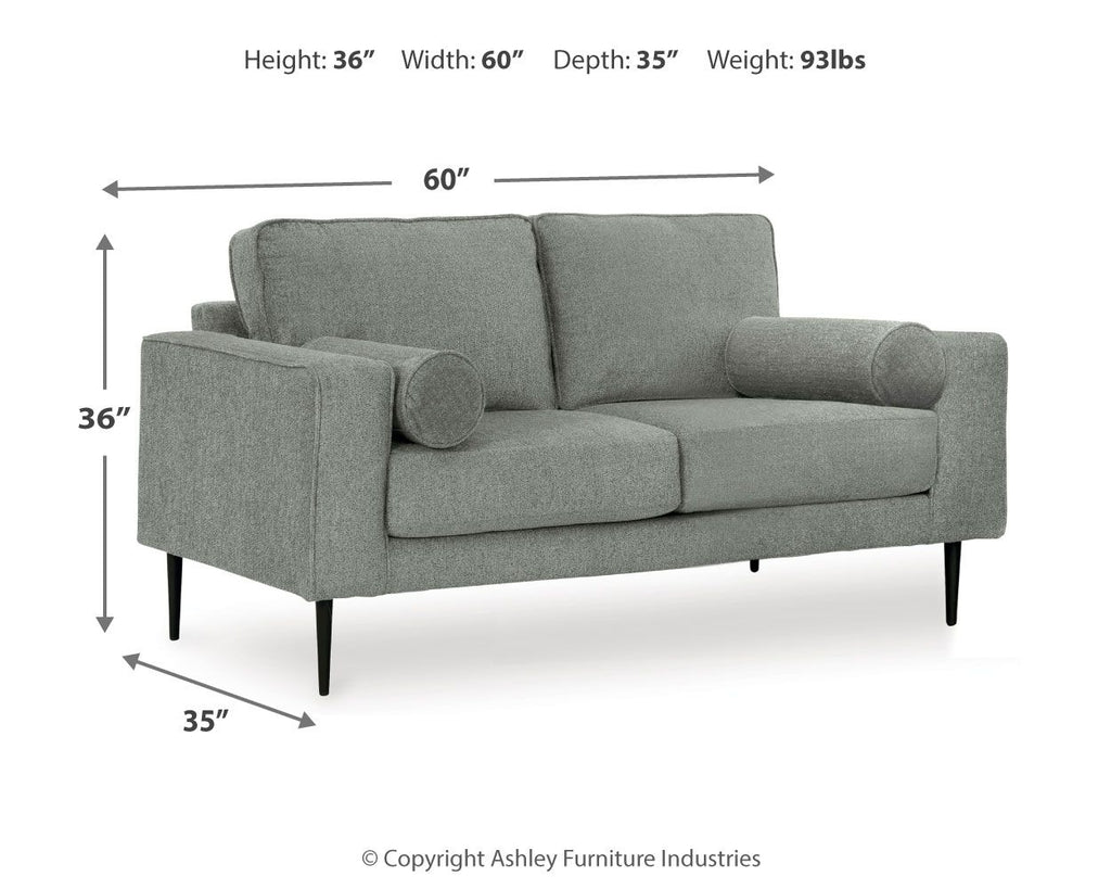 Charcoal loveseat with rolled arms and two round accent pillows; measures 60 in wide